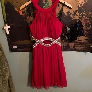 Deep red dress with cutout crystal detailing